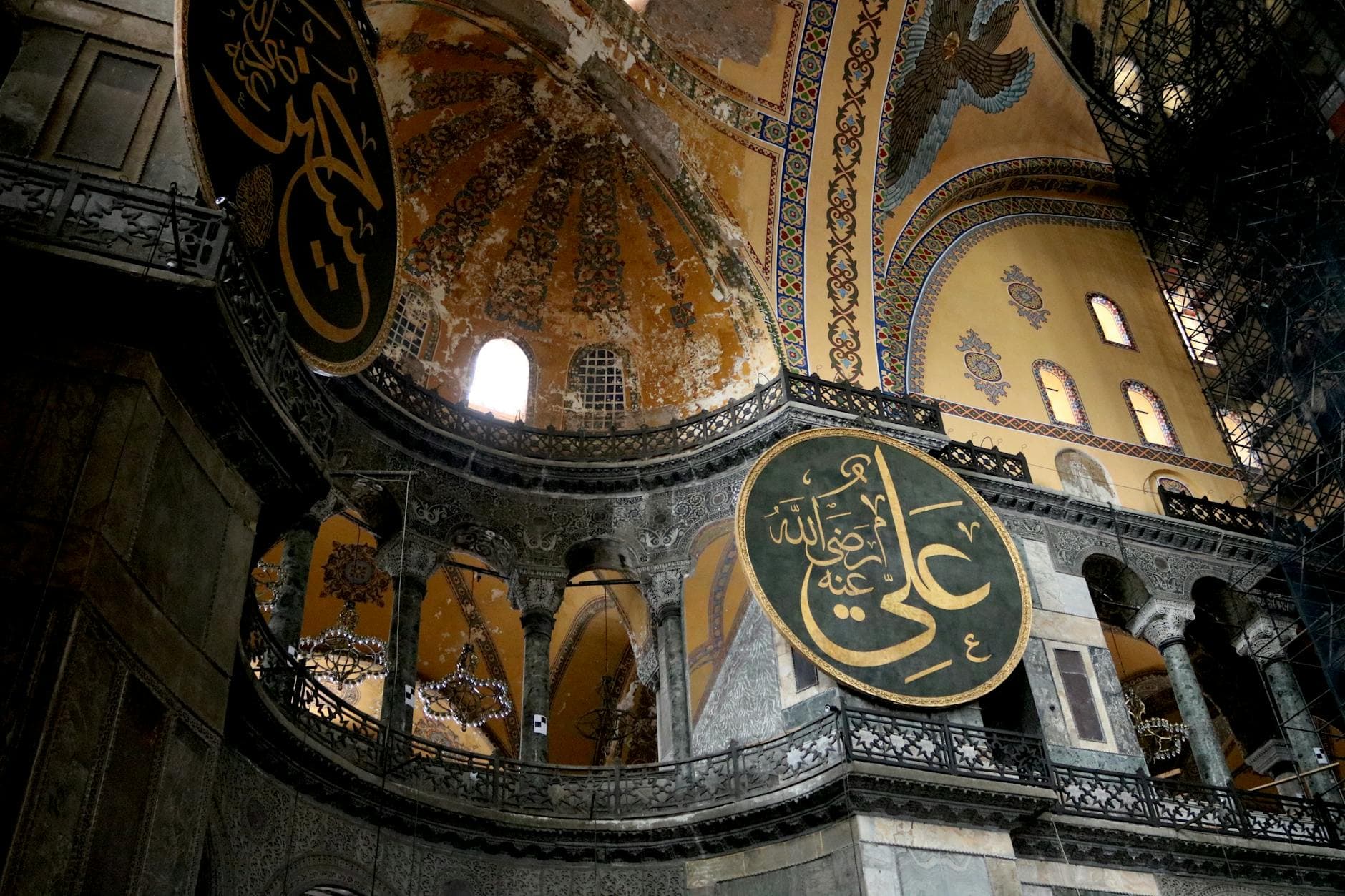 Photo by Merve Gül on Pexels Low angle view of the historic Hagia Sophia interior dome with Arabic calligraphy.